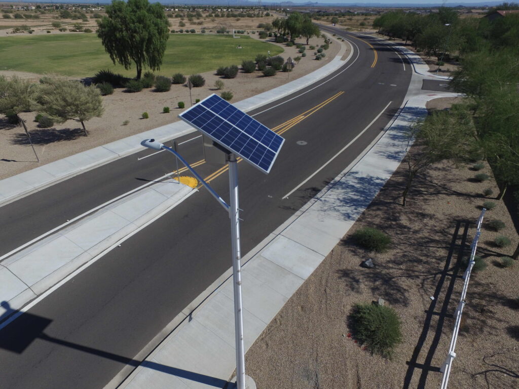 divided two lane road with solar streetlight