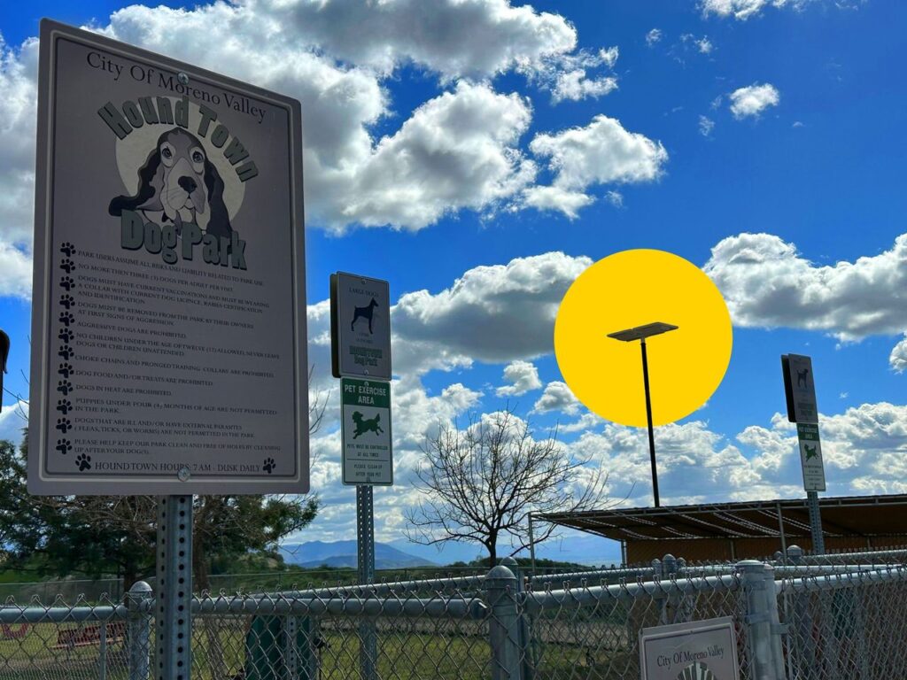sign for Hound Town Dog Park in the City of Moreno Valley with Sol's iSSL solar light highlighted in the background