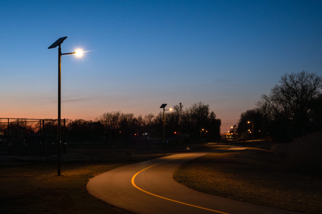 image of Indiana's Erie Lackawanna multi-use path at dusk with two solar lights switched on