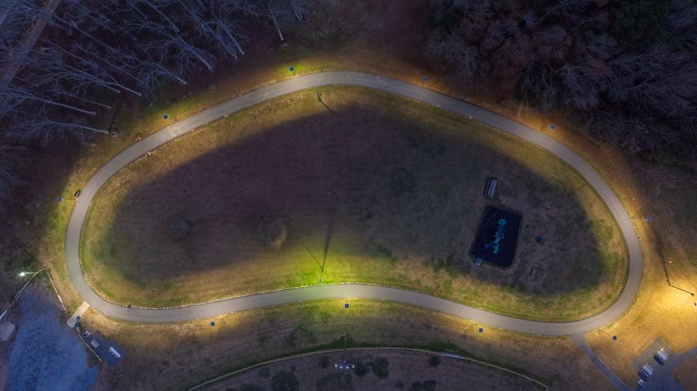 aerial image of walking track illuminated with Sol's iSSL solar lights