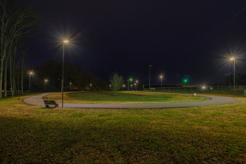 walking track in the dark with Sol's iSSL solar lights