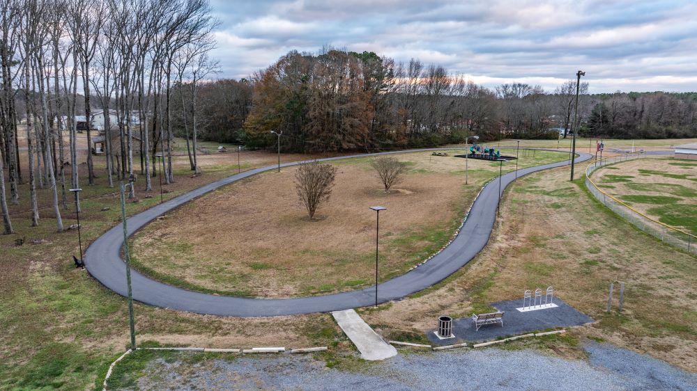 aerial image of walking track during the day wiht grey skies and Sol's iSSL solar lights